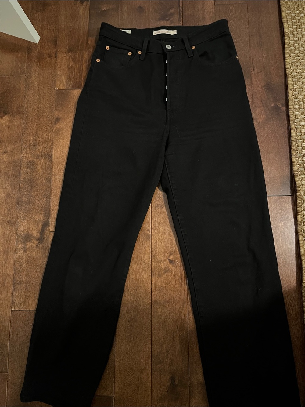 Black Leviโs ribcage straight ankle 27